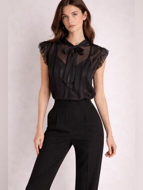 Calvin Klein women’s blouse 
Black with neck tie, shirt sleeves
New ‎ size XL